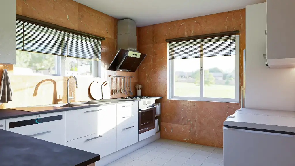 Cuisine en L – Finition blanche mate, avec un plan de travail en granit.