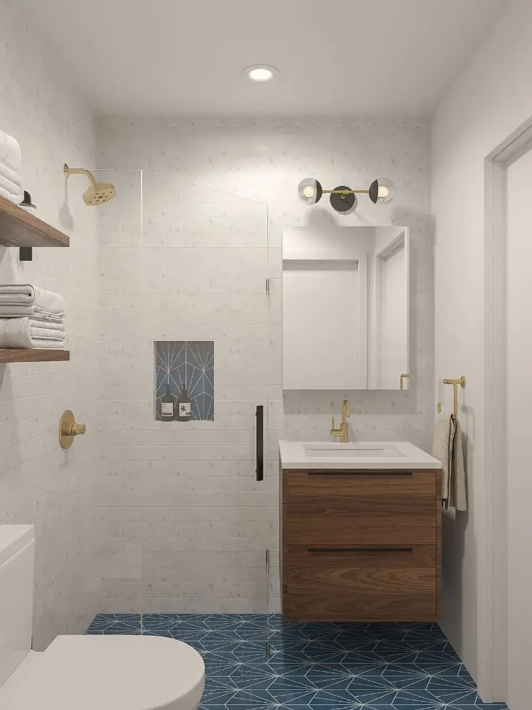 Salle de bain moderne avec sol bleu géométrique et finitions dorées