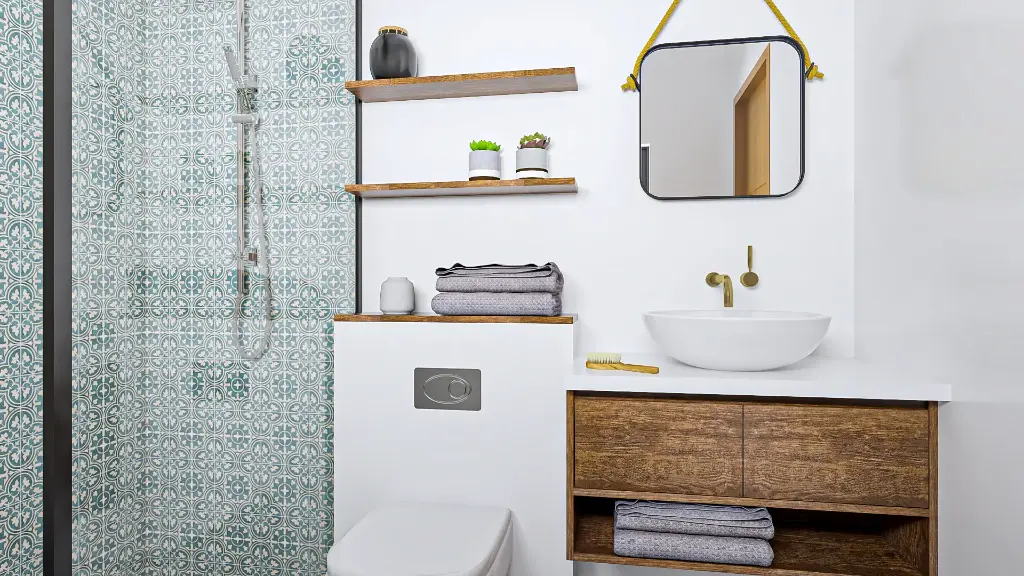 Salle de bain vintage avec carreaux artisanaux et accents en laiton