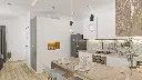 Cuisine en U – Finition blanche mate, avec un plan de travail en bois massif.