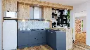 Cuisine en U – En teck, avec un plan de travail en quartz.