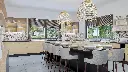 Cuisine en U – En hêtre Willow, avec un plan de travail en granit.