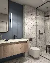 Salle de bain moderne avec terrazzo et mur bleu texturé